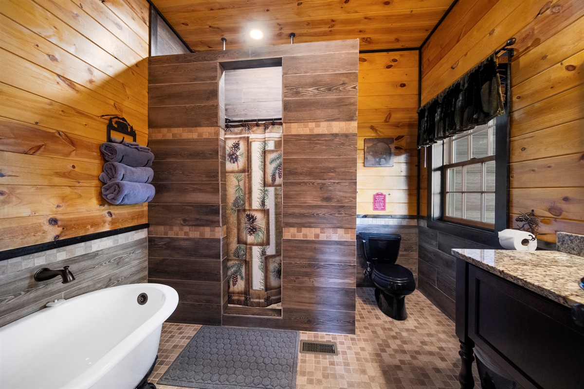The first floor bath is the biggest bath. It has the soaking tub, large 2 person shower with dual shower heads and large vanity. All vanities are furniture quality. Makeup mirror and hair dryer under the sink too.