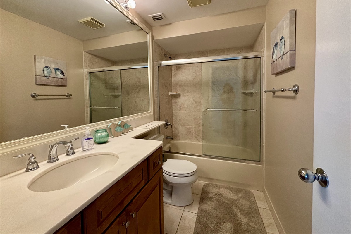 The first bathroom is located right off the front bedroom.