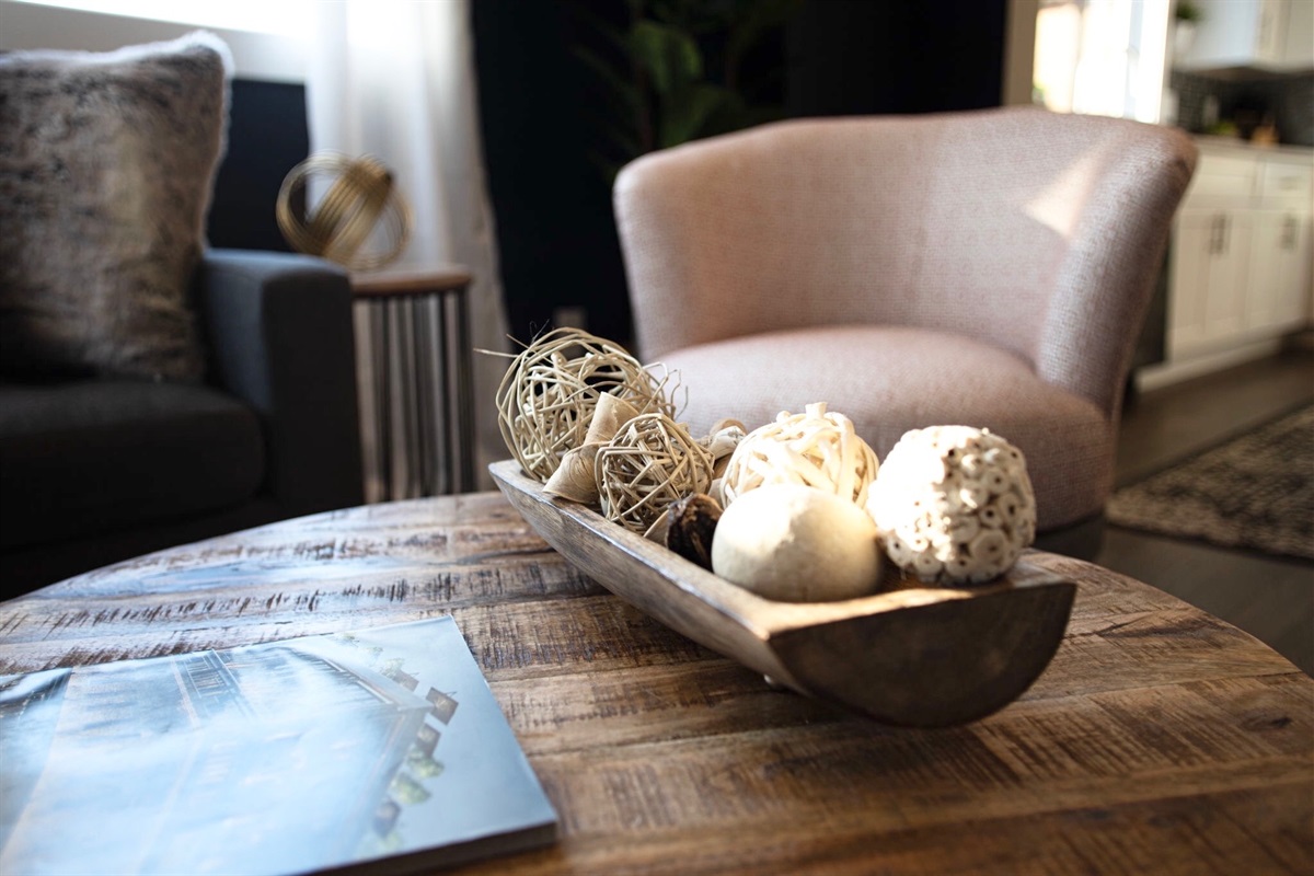 - Cozy up in this stylish lounge where warm tones and textures invite you to relax - Rustic wood table, modern accents, and soft lighting create instant comfort - Perfect spot to flip through a magazine, sip your drink, or just unwind in style