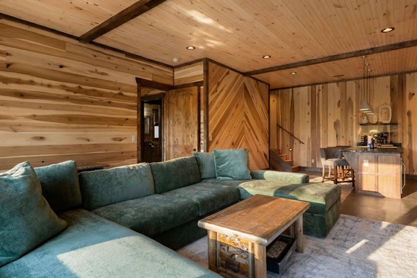 Unwind on the plush sofa in this spacious lounge area, perfect for movie nights or lazy afternoons.