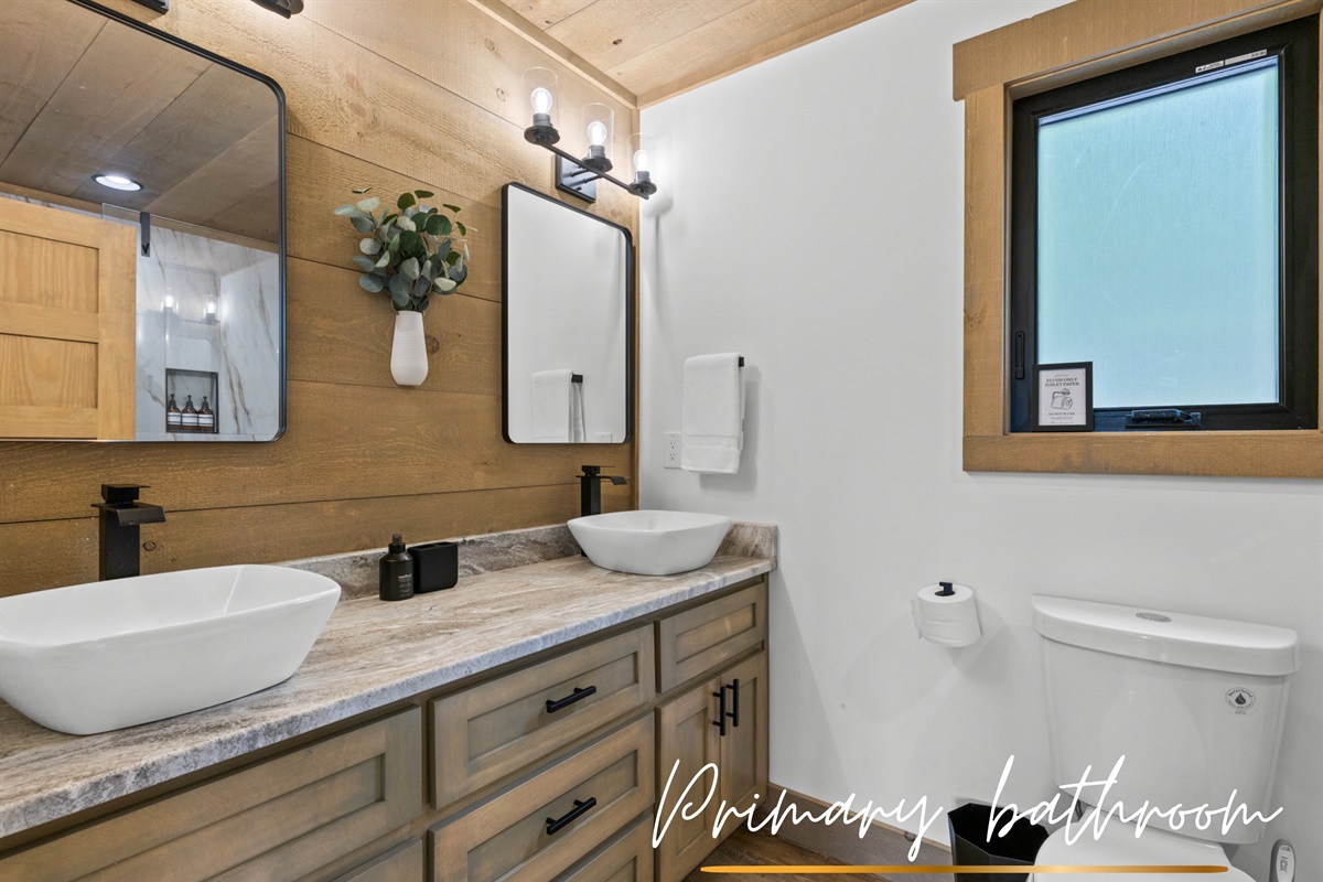 Sleek, serene, and functional. This double vanity is both pretty and practical.