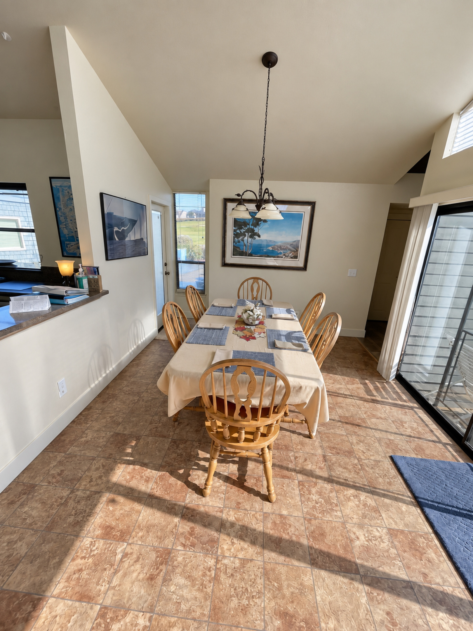Dining area next to kitchen and overlooking hot tub deck