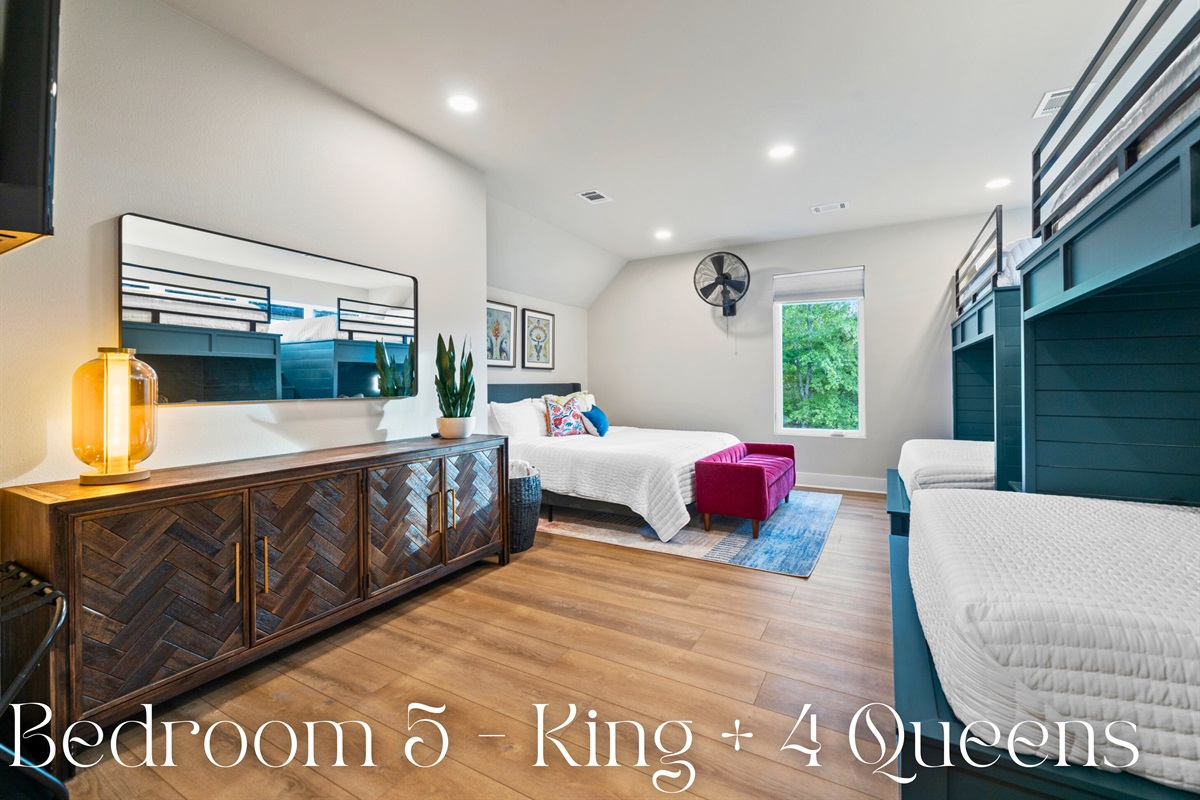 Ideal for large groups or families, this bedroom features a king bed and four built-in queen bunks.