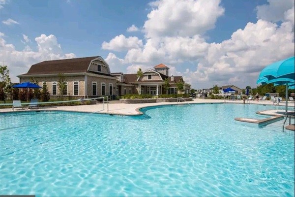 Welcome to our seasonal outdoor pool, available from June to mid-September! Take a dip, soak up the sun on lounge chairs, and enjoy the summertime bliss. It's your go-to spot for relaxation and staying cool during the warmer months. ‍♂️