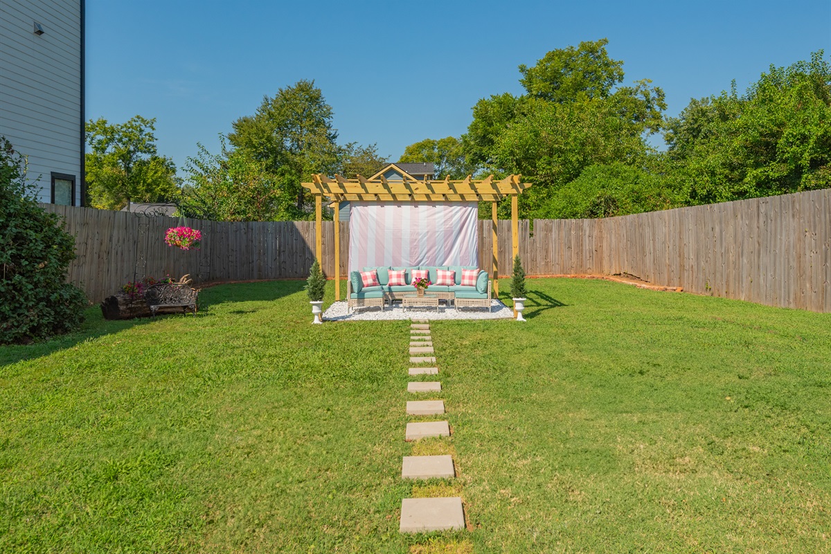 Covered pergola with ample seating!