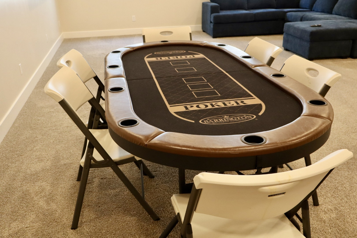 Plans are underway to outfit this large lower-level space with a Poker  table, sectional sofa, big-screen TV, and more—stay tuned for an exciting entertainment area!