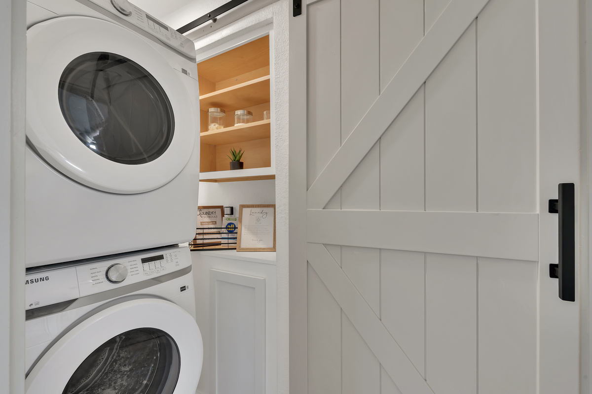 Full size in-unit laundry with laundry supplies provided.