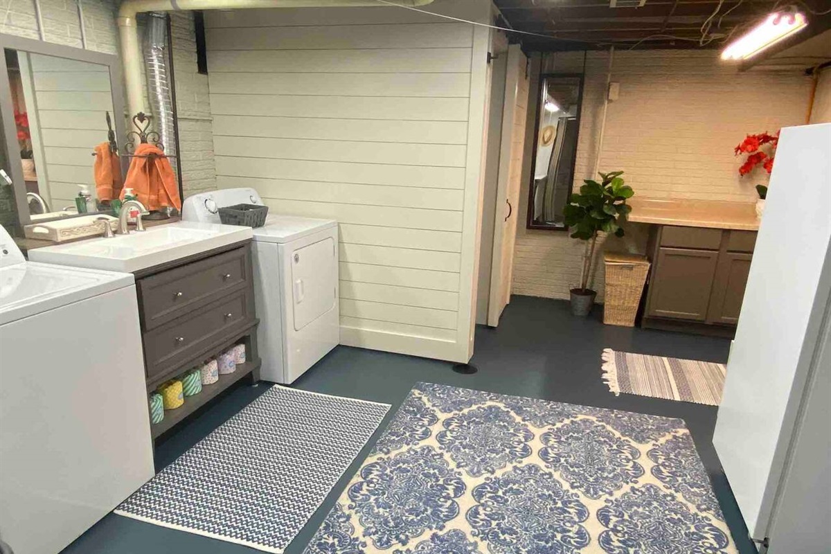 Newly remodeled laundry room with full bathroom.