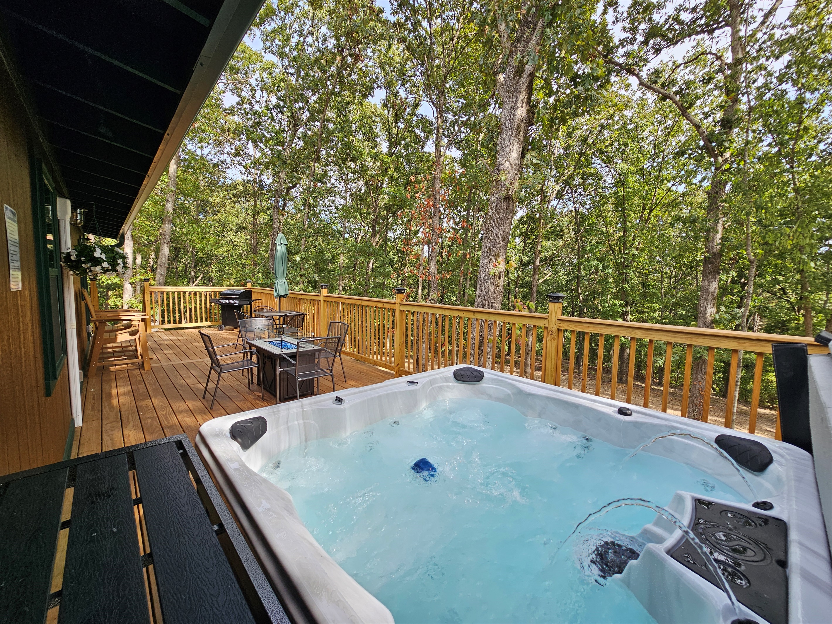 Enjoy dinner on the deck, fire up the grill, then slip into the hot tub — all with a peaceful forest view.