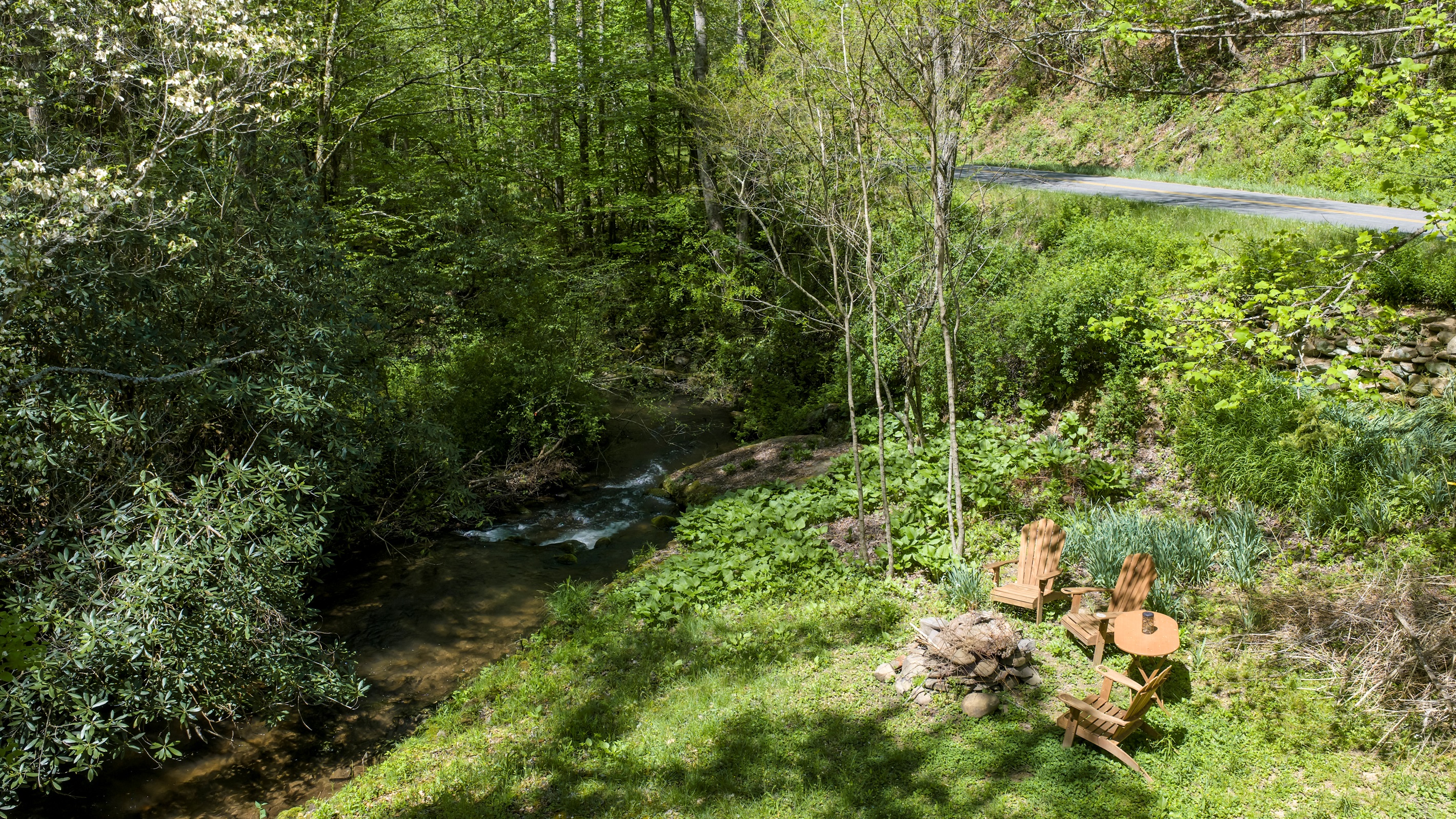 Creekside fire pit with the sounds of Yellow Creek in the background.