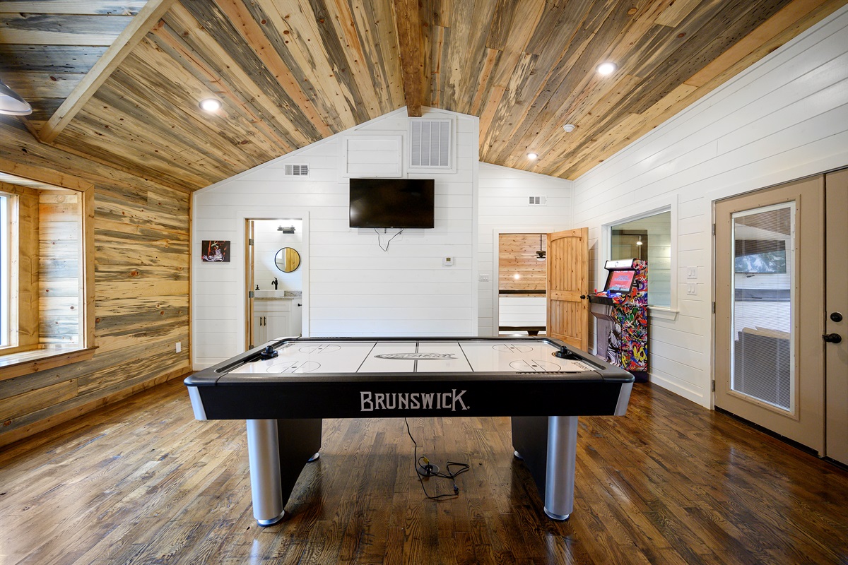 Air hockey battles in the game loft tend to get loud in the best way possible. 
Fast hands, friendly rivalries, and nonstop rematches turning this upstairs hangout into everyone’s favorite part of the cabin.