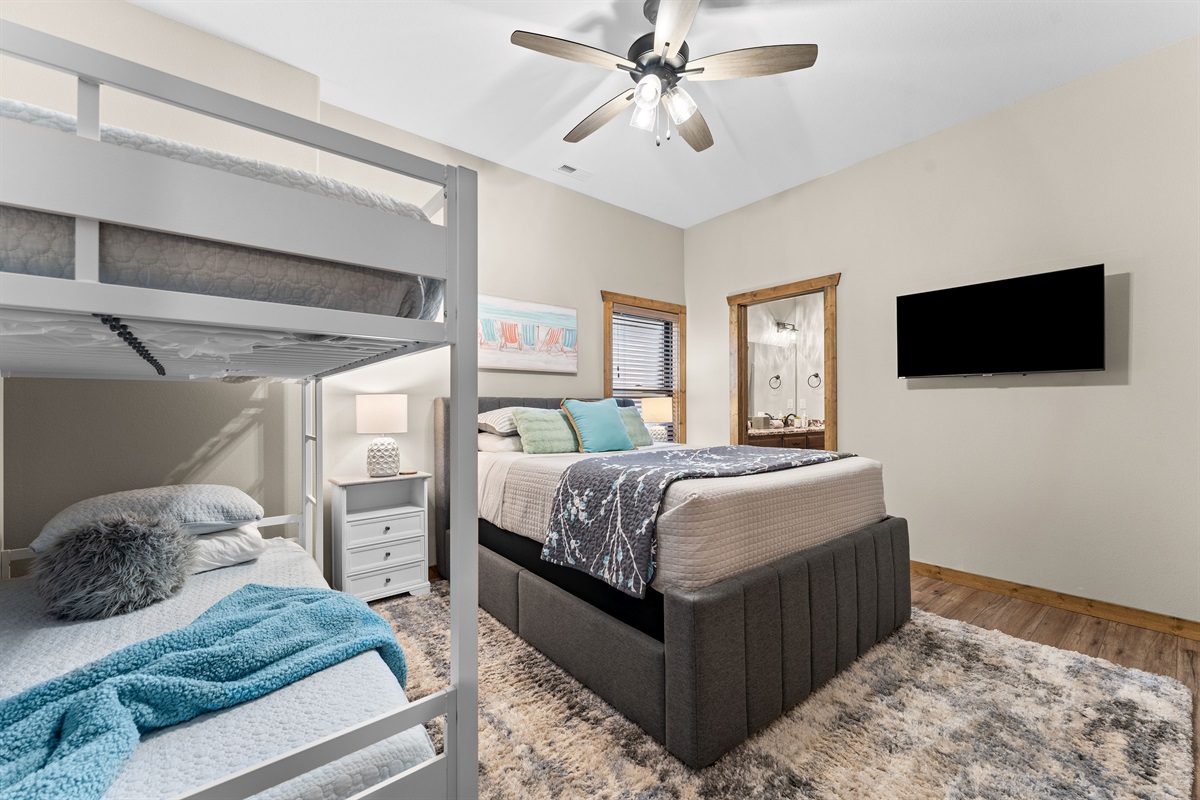 Lower level queen bed and bunk bed room with jack & jill bath 
