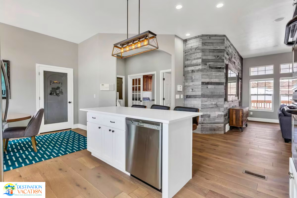 Spacious kitchen island designed for gathering and conversation.