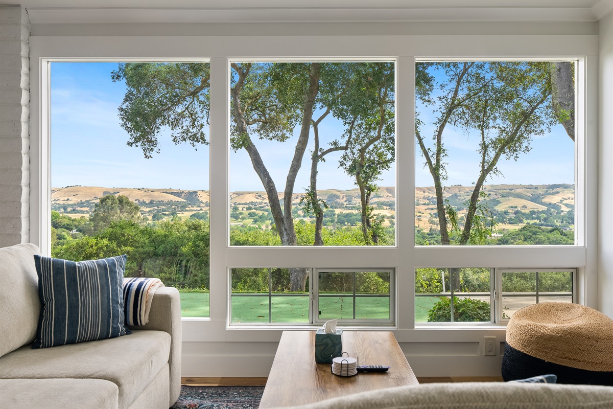 A sunlit lounge with sweeping views.
