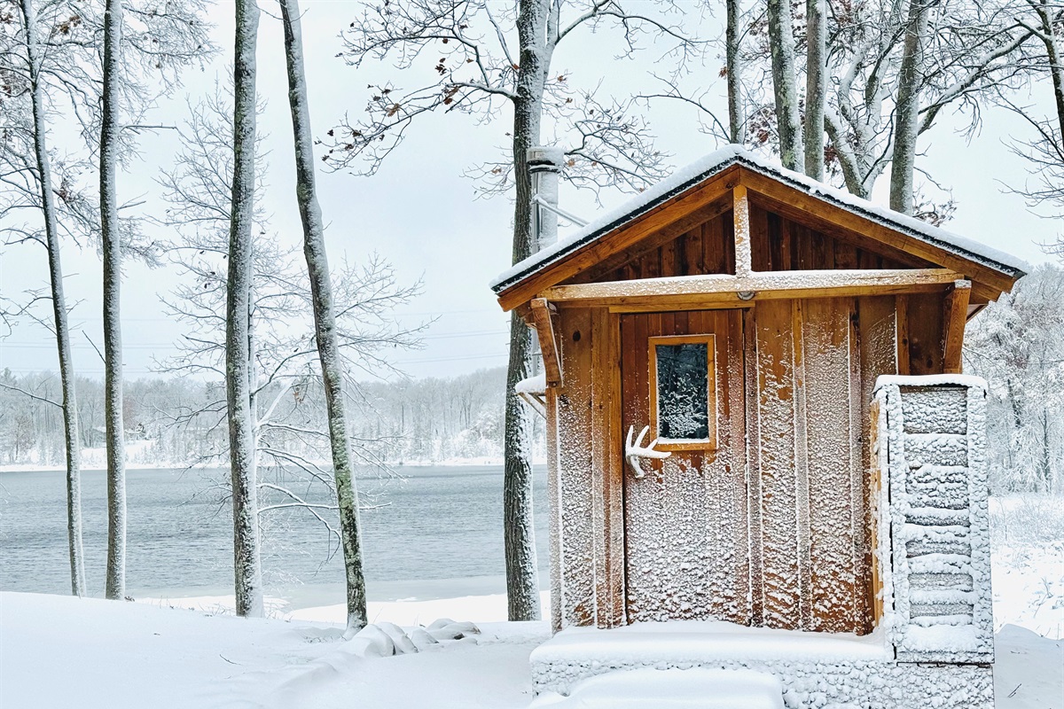 Our authentic wood burning sauna with a great view of the lake.
