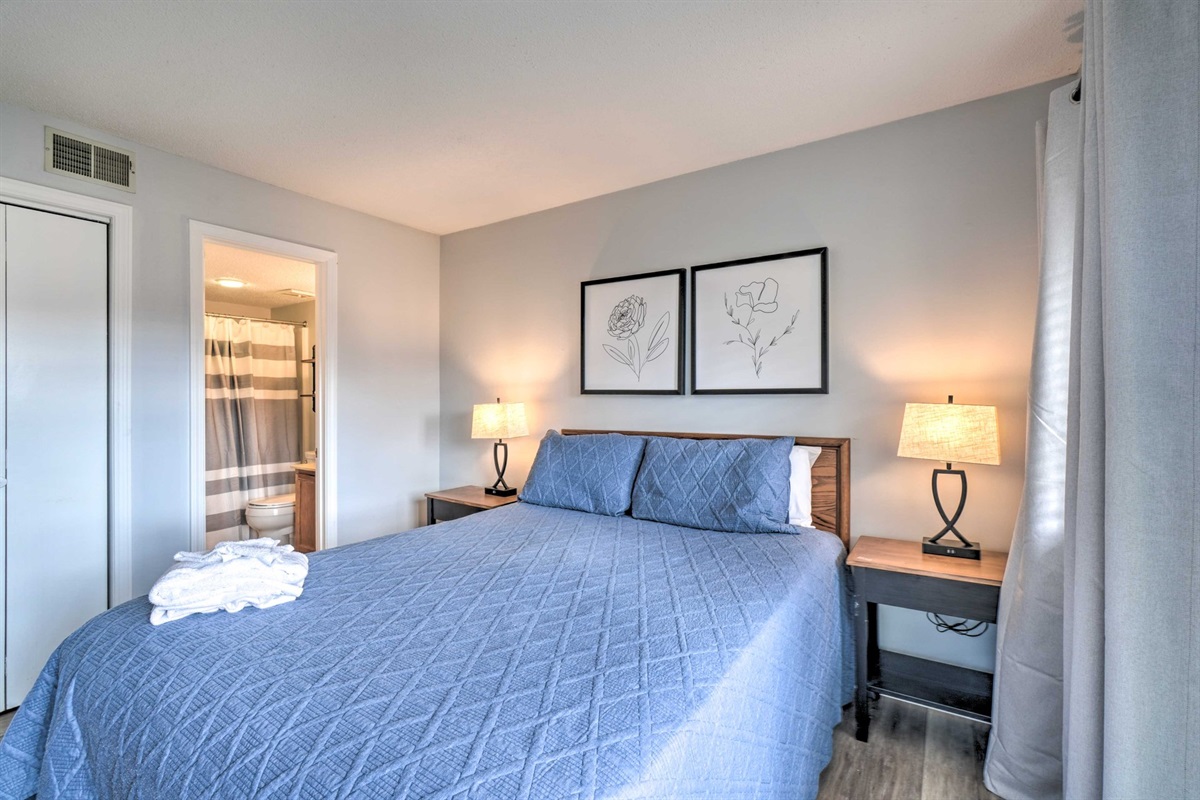 Bedroom #1 with en suite bathroom & balcony access