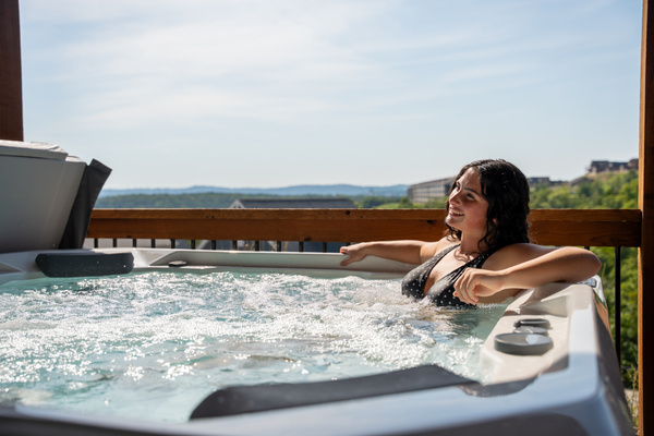 Wellness porch. 7-person Hot Springs Hot Tub overlooking our quiet cove on Table Rock Lake.