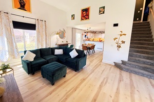 Step into a cozy and stylish retreat designed for comfort and connection. With plush seating, warm natural light, and a welcoming ambiance, it's the perfect space to unwind or gather with love
