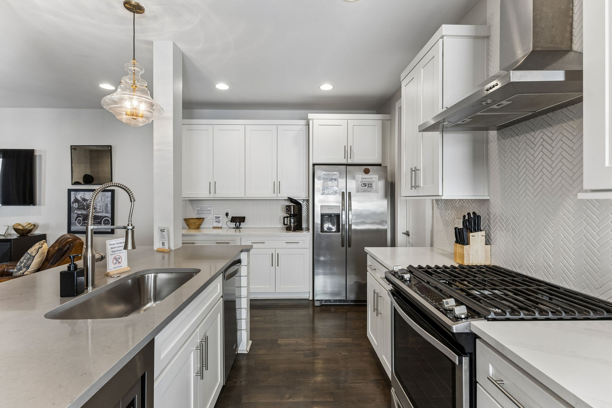 Cook for the whole group without feeling cramped &mdash; island with sink, full-size appliances, and enough counter space to actually prep a real meal.