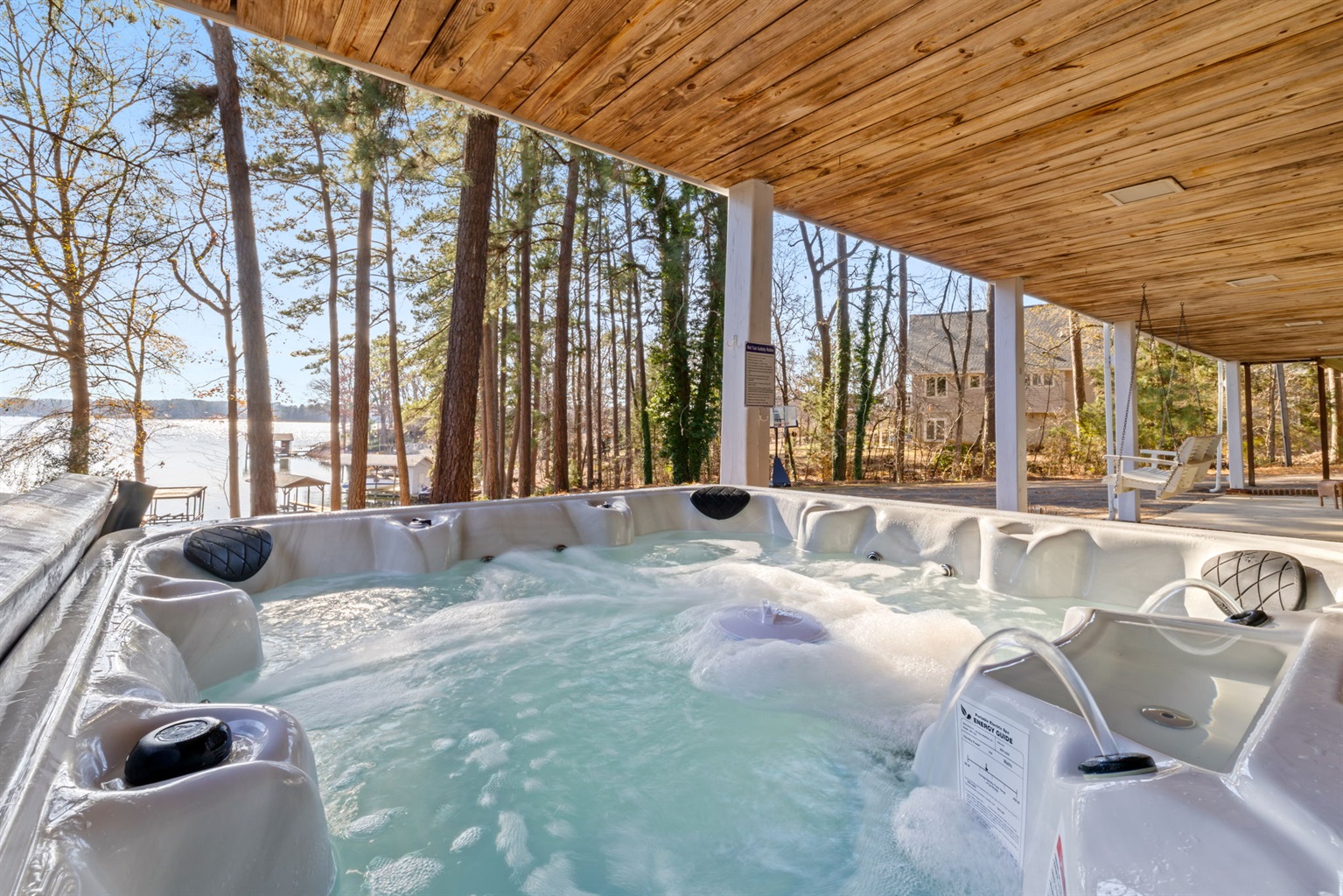 Relax in the new 7-person hot tub while taking in main lake views!