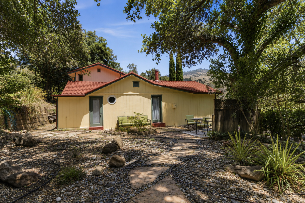 Back of the property with private seating to relax