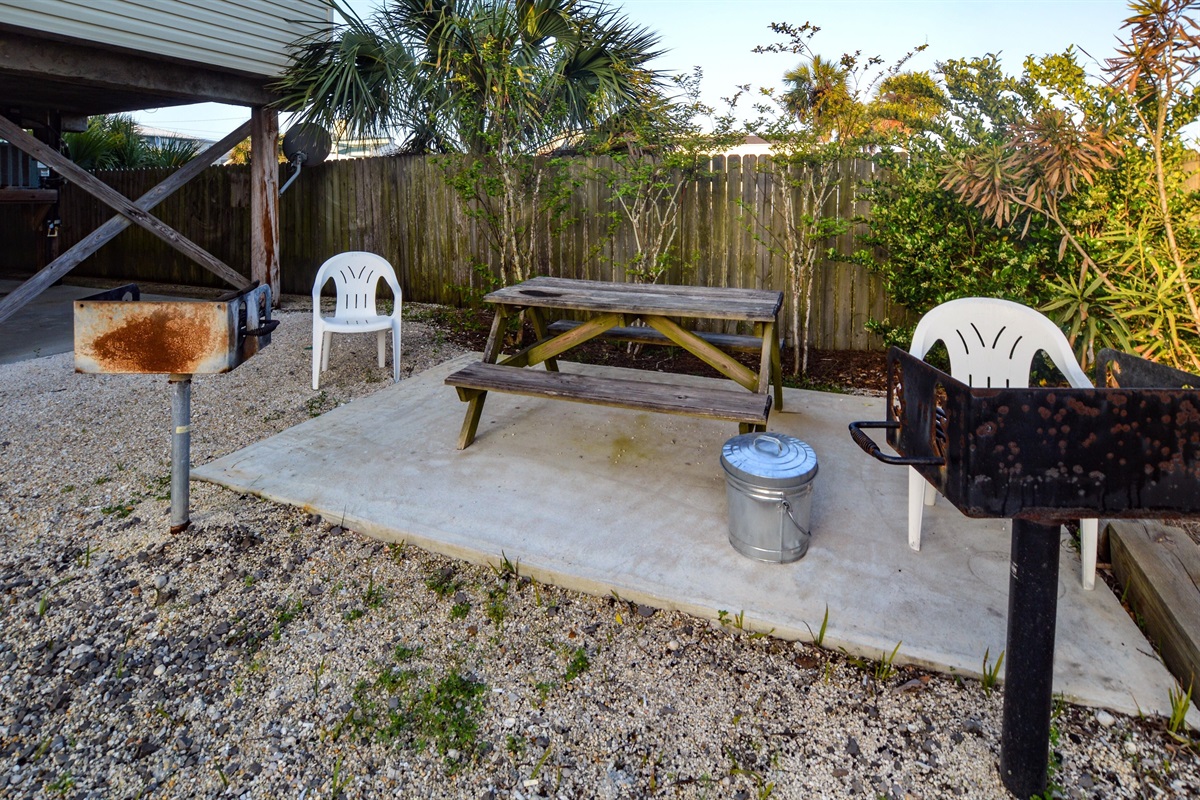 Grilling Area - A small grilling area is provided for your convenience and offers a picnic table and 2 built in, charcoal grills. Please be sure to pickup your trash and clean up after your group.