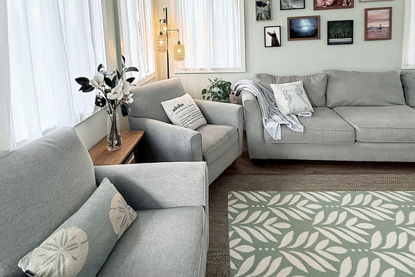 Living Room | Representative Interior. Finishes, decor, and furniture, vary by duplex unit.