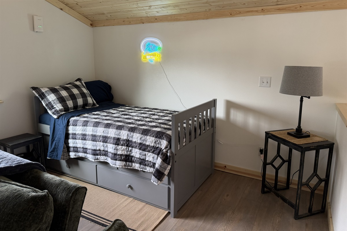 Loft area includes sleeper sofa and additional bed (twin bed with trundle bed)
