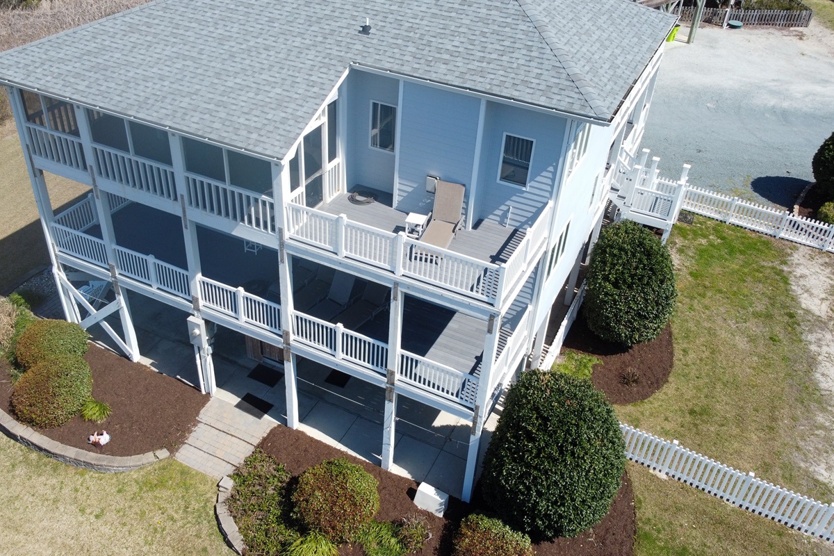 Spacious decks and screened porch overlooking the marsh and sound
