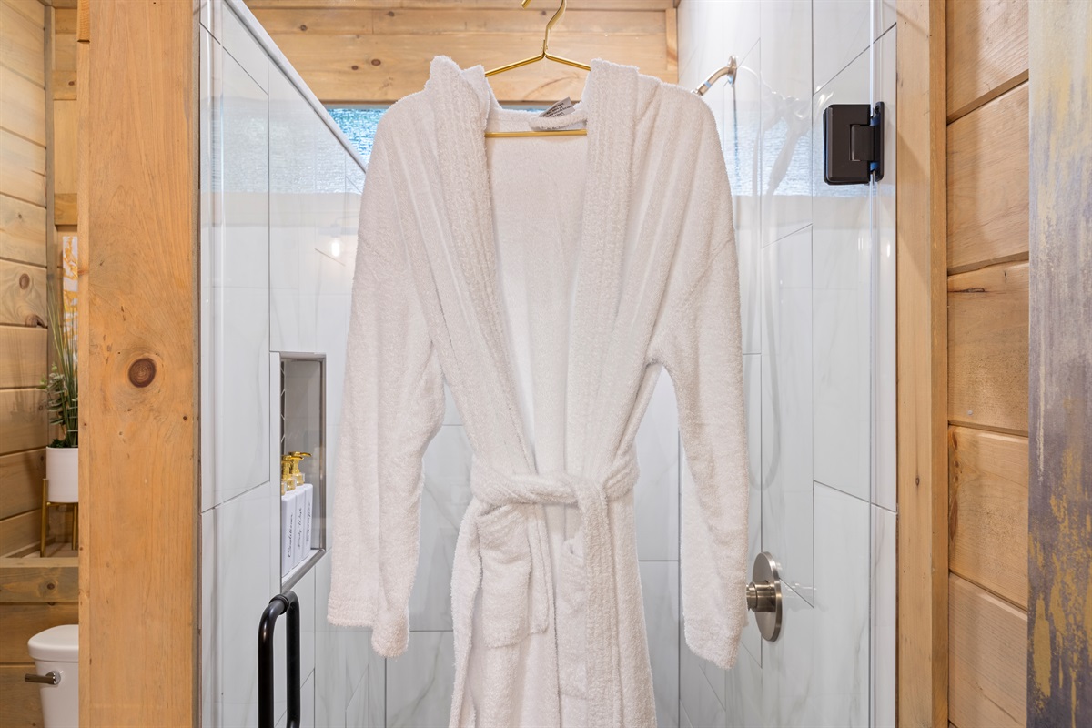 Designer robes included. A splash of Boujee with every rinse.