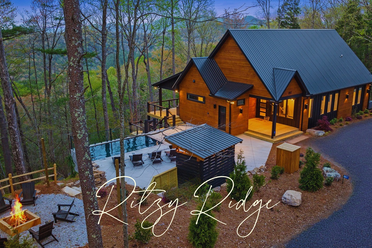 Welcome to Ritzy Ridge, this modern mountain oasis is awaiting YOU! Experience swimming with a picturesque mountain back drop. Laidback mountain luxury living!