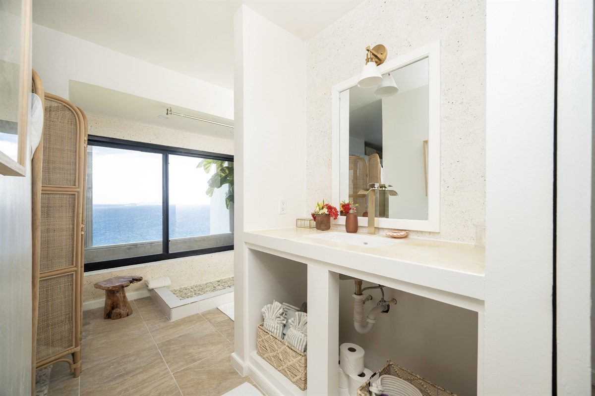 Refresh and recharge in this elegant, modern bathroom.