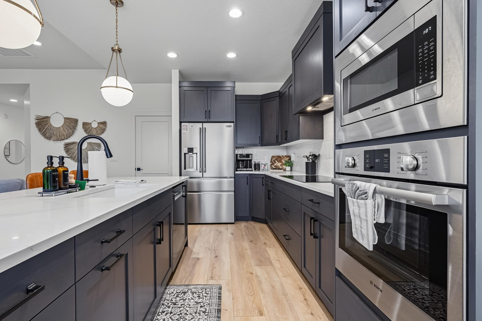 Enjoy a modern kitchen featuring stainless steel appliances and plenty of counter space for cooking and meal prep.