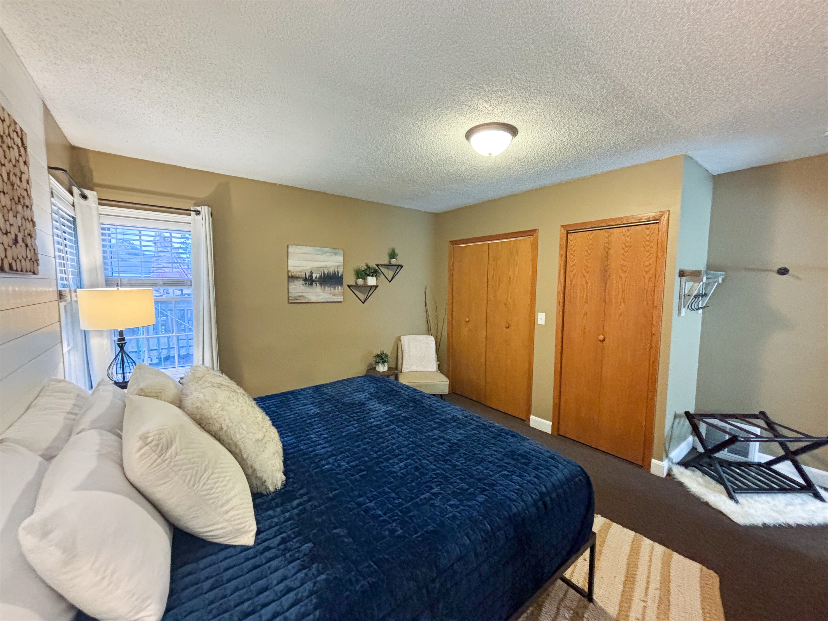 Tranquil and welcoming—enjoy ultimate comfort in our carefully curated bedroom.