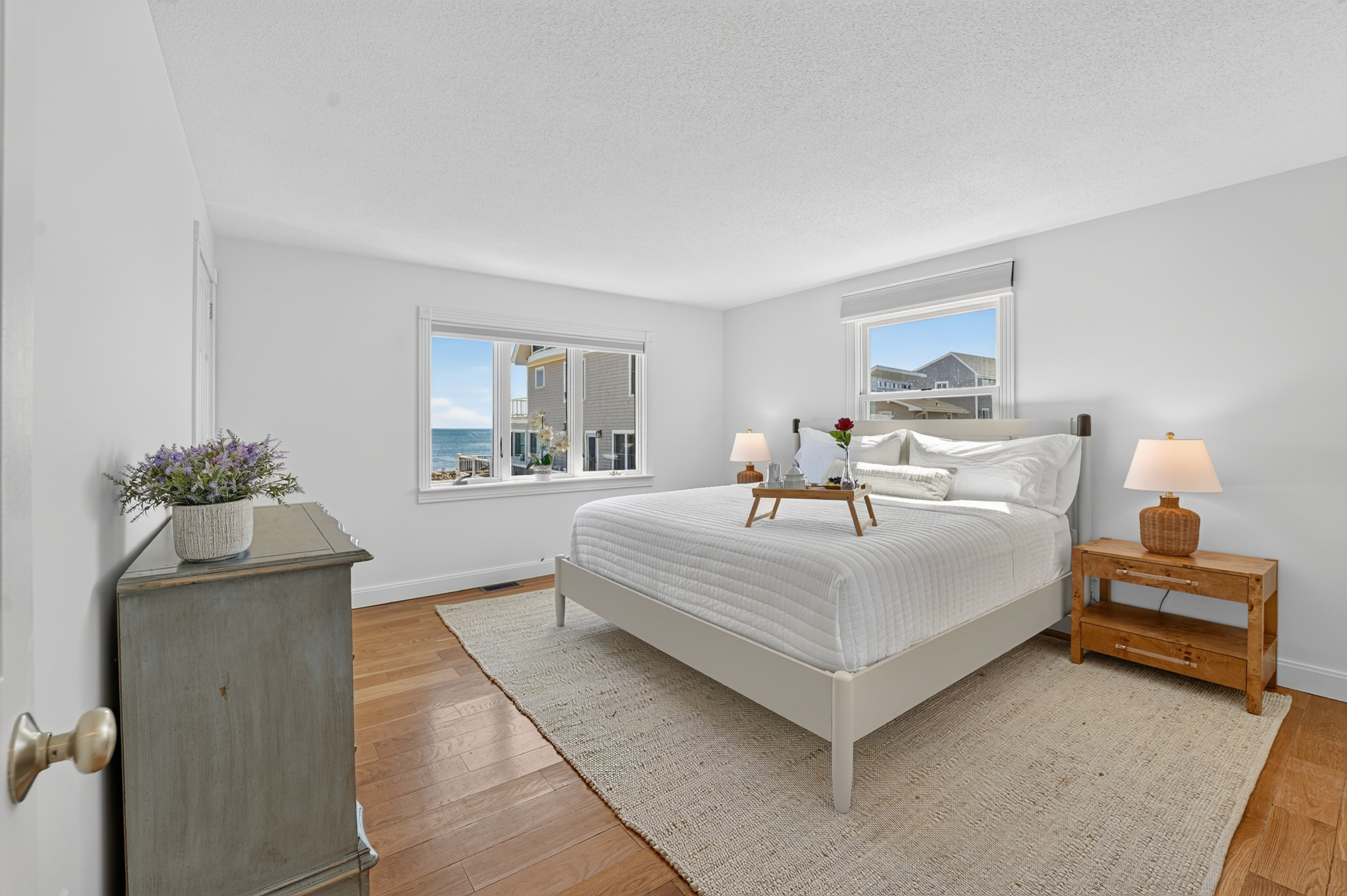 Peaceful bedroom with a comfortable bed, natural light, and plenty of space to unwind.