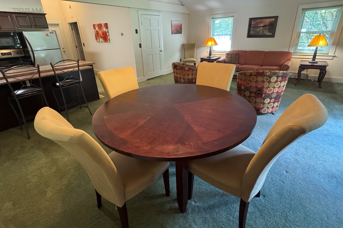 Dandelion apartment dining area with seating for up to 6.