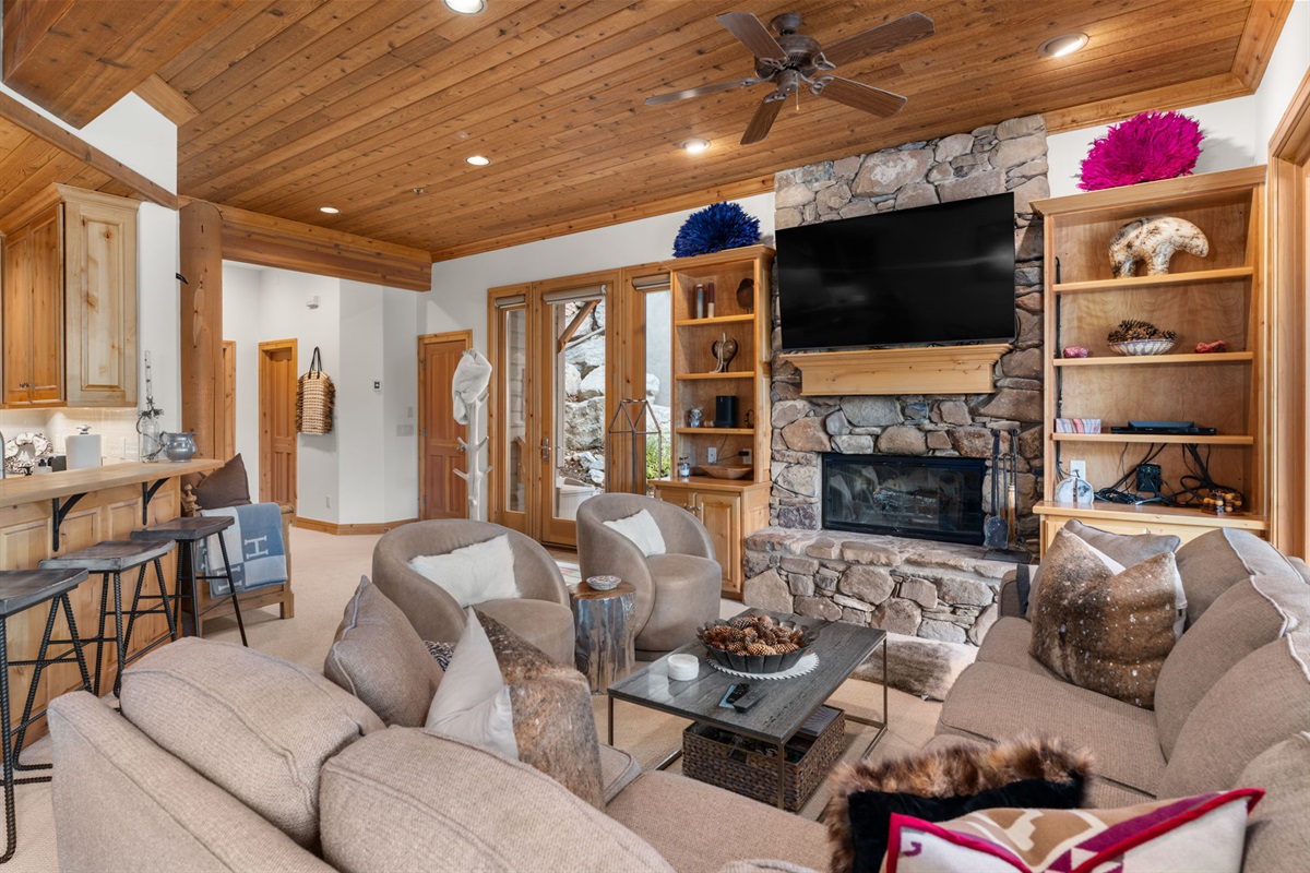 Beautifully appointed living room with real wood fire