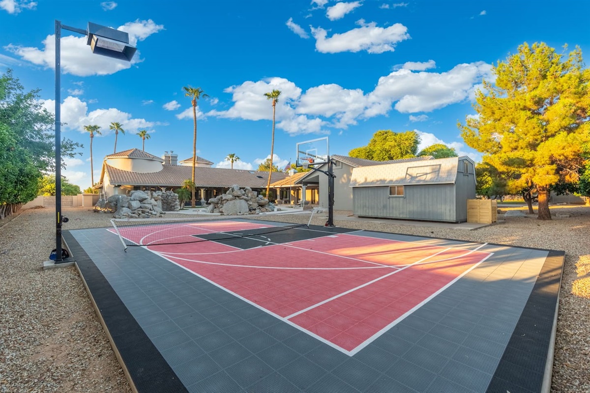 Challenge your group to a friendly match or practice solo shots in this stunning backyard setup.

