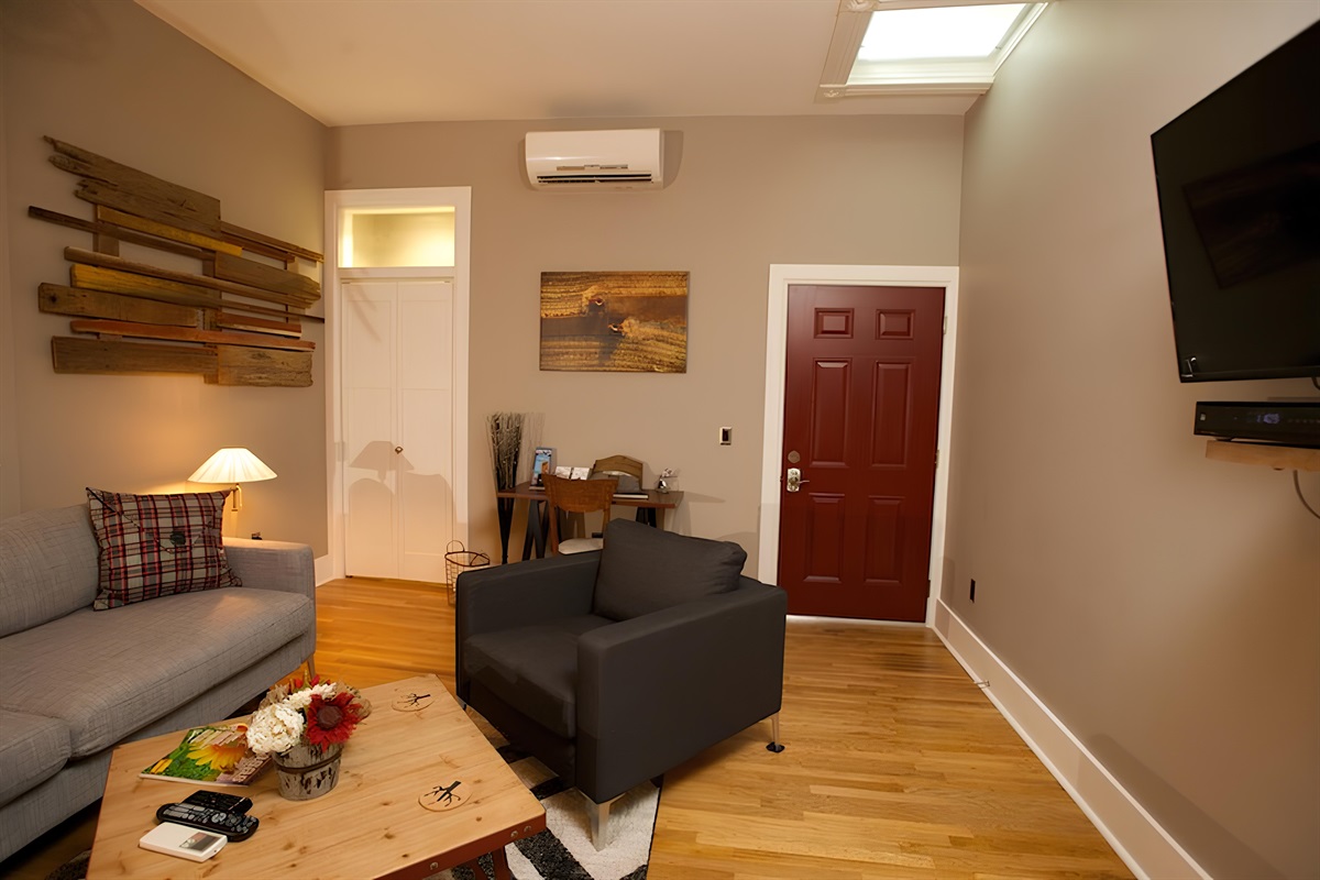 Wall-mounted Smart TV offers Hulu + Live TV (no ads)