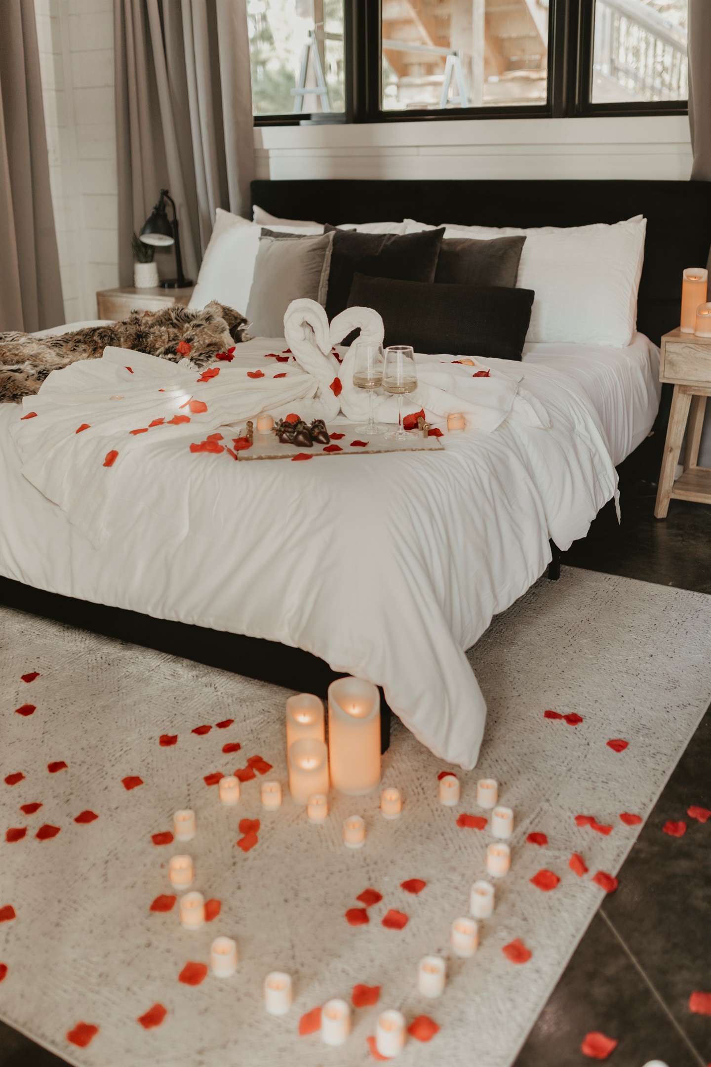 Romance awaits—plush bedding, swan towels, and rose petals set the mood for an unforgettable stay. Whether it’s a honeymoon, anniversary, or just because, this cozy retreat is made for love under the pines.