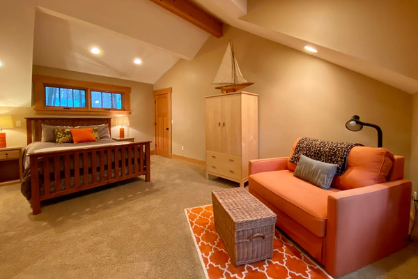 Bedroom #4 with Queen and pull out sleeper sofa. This room is between the main house and bunk room, perfect for parents that might want to be closer to their children sleeping in the bunk room. 