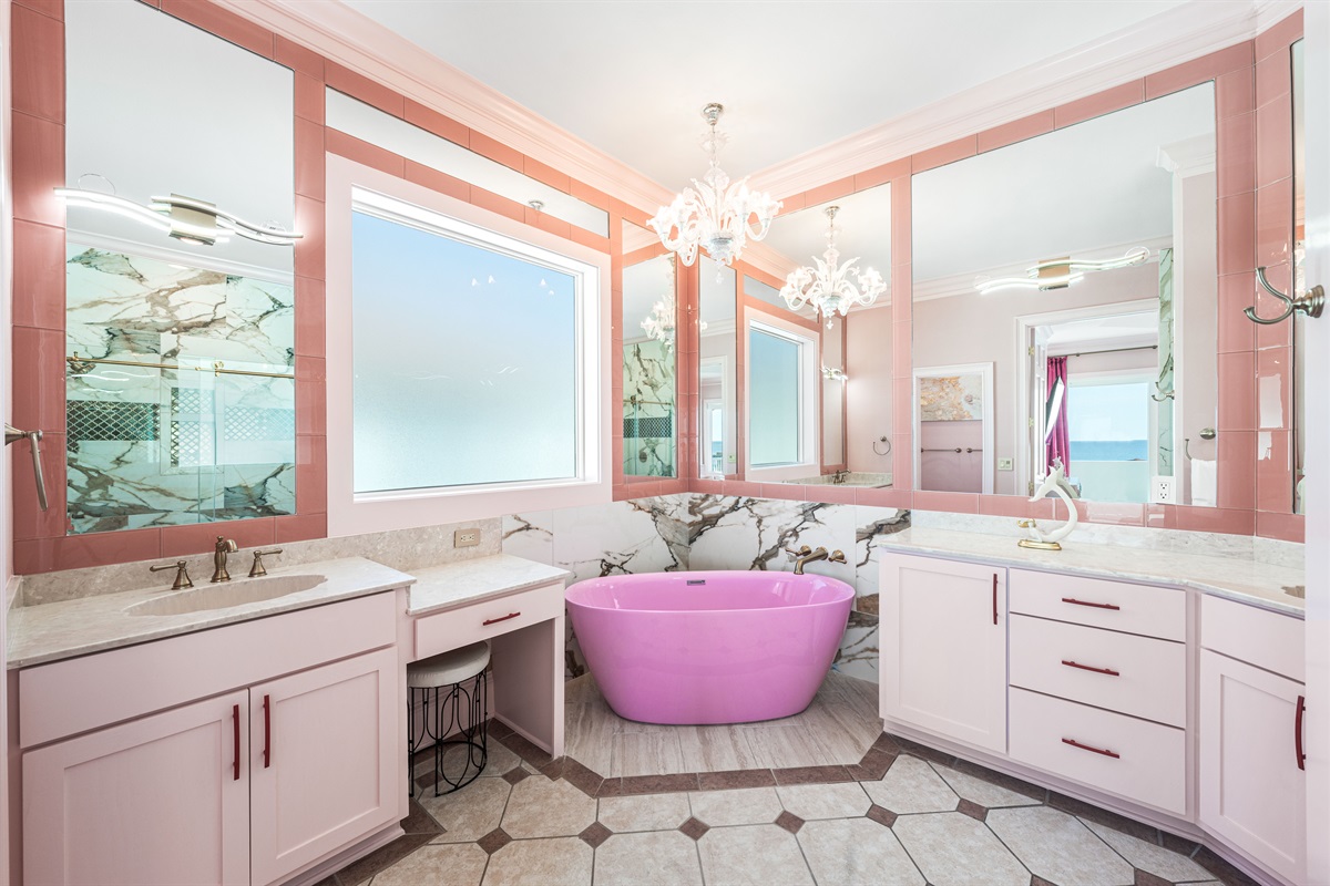 Grand Master Ensuite: A spa-like sanctuary, featuring a large soaker tub and a double walk-in shower. With double sinks and plenty of vanity space, this bathroom offers the ultimate in luxury and convenience.