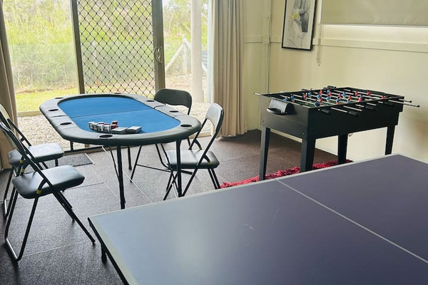 Carlenes Getaway’s games room keeps downtime simple, with poker, foosball and table tennis ready after exploring Loch Sport.