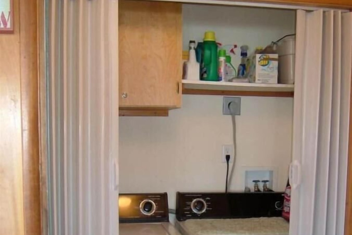 laundry closet in entry way