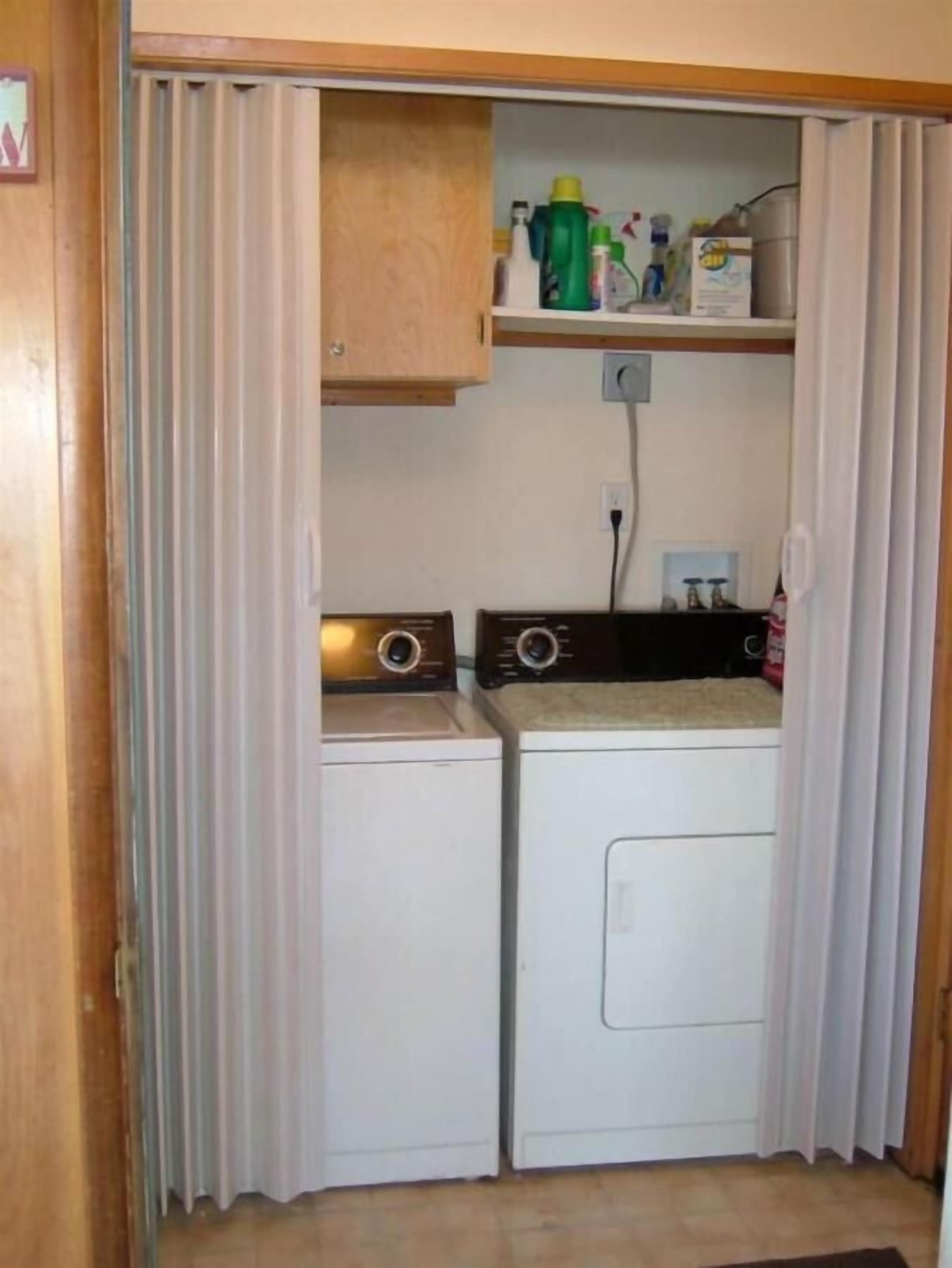 laundry closet in entry way