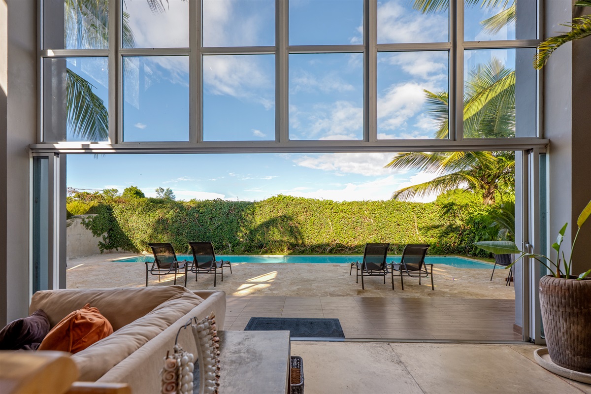 Relaxing pool area with comfortable loungers.