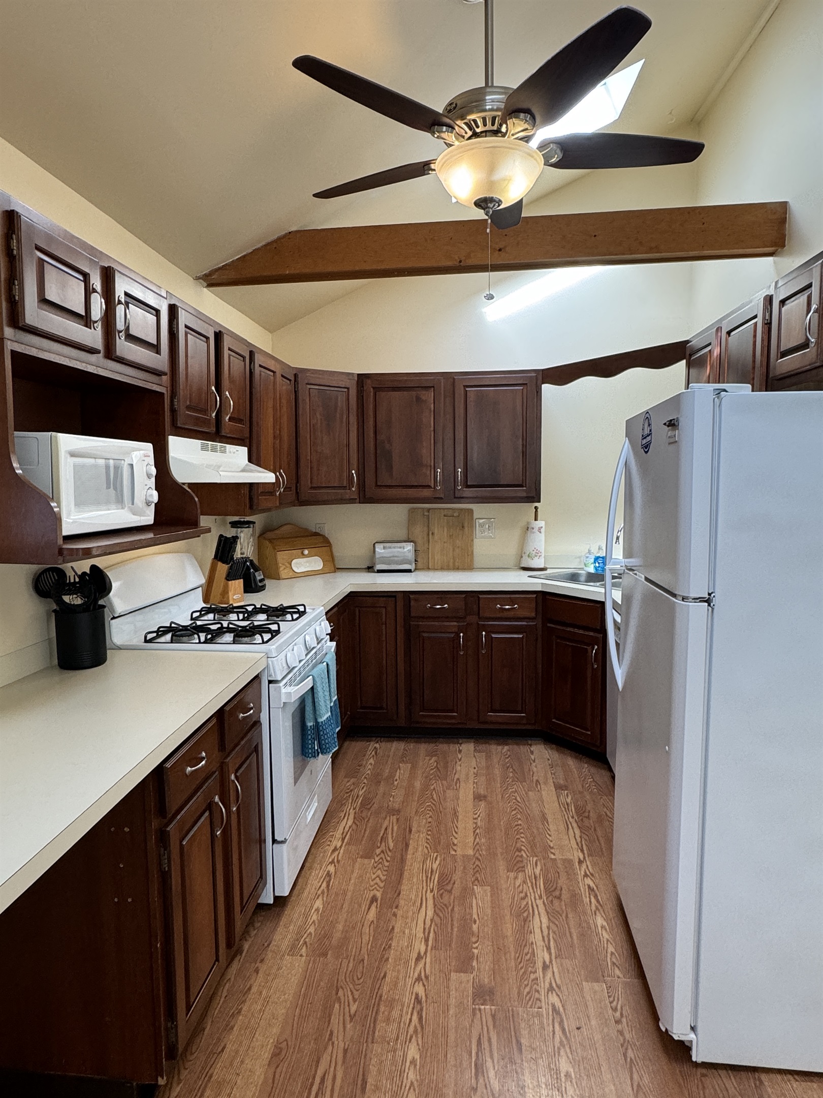Cooperstown Cottage kitchen equipped with everything you need including lots of natural light billowing in from the skylights.