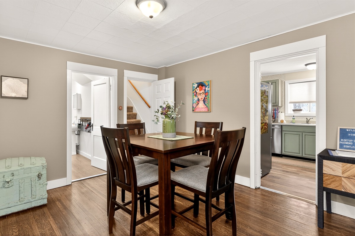 Additional seating or game table leading to the full bathroom, kitchen or upstairs - main floor