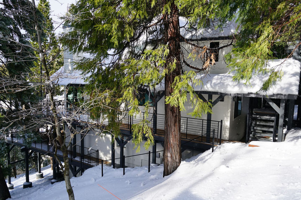 Covered parking and walkway to the front door.
