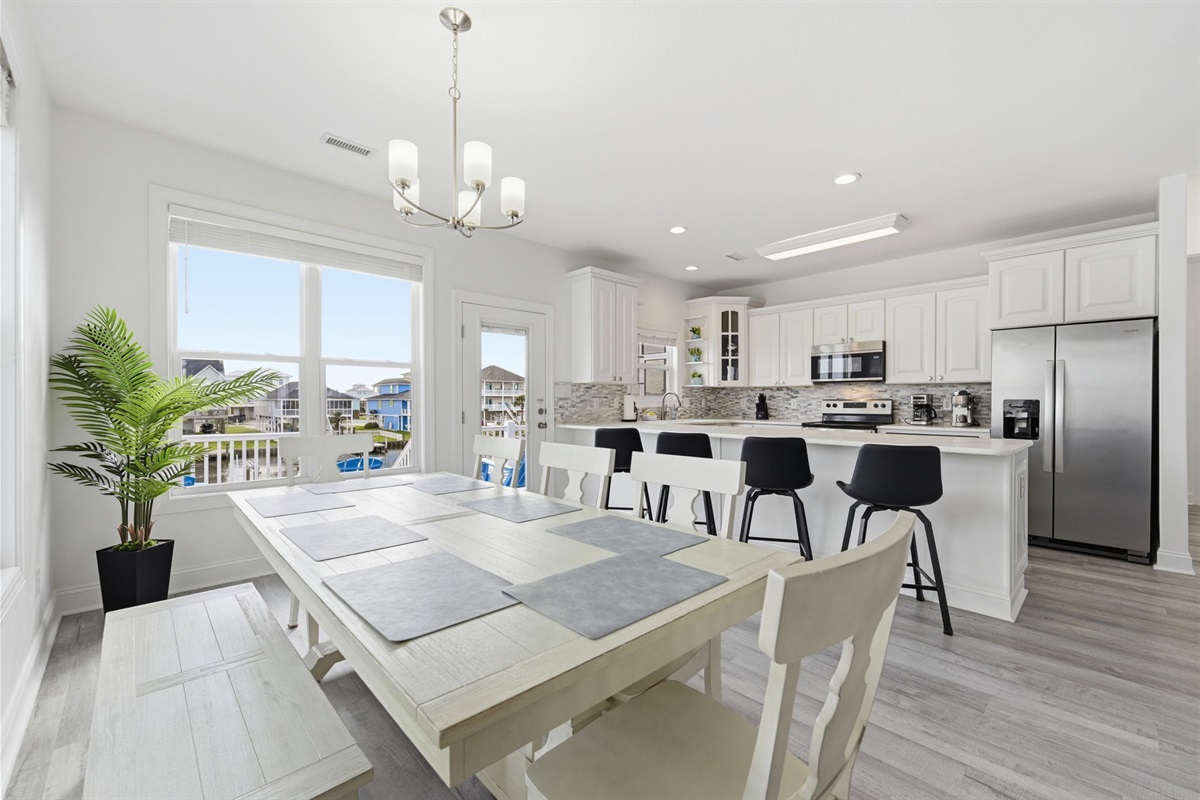 Gather around for family dinners with waterfront views just outside the window